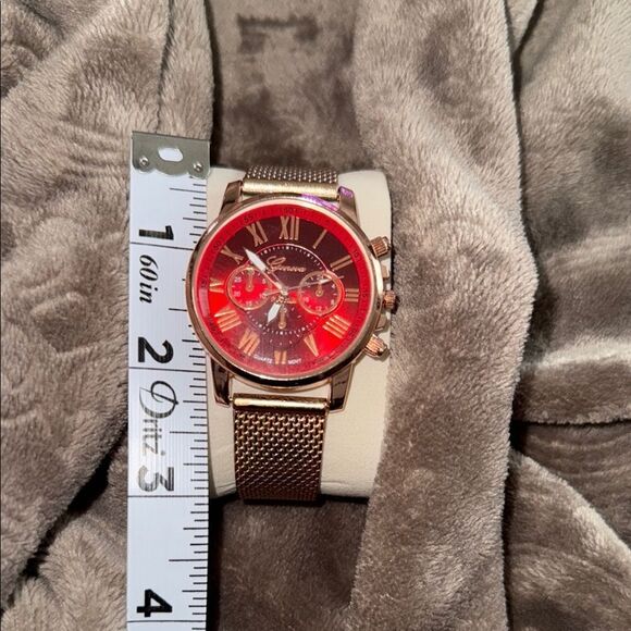 Geneva Gold and Red Watch with Chronograph Features